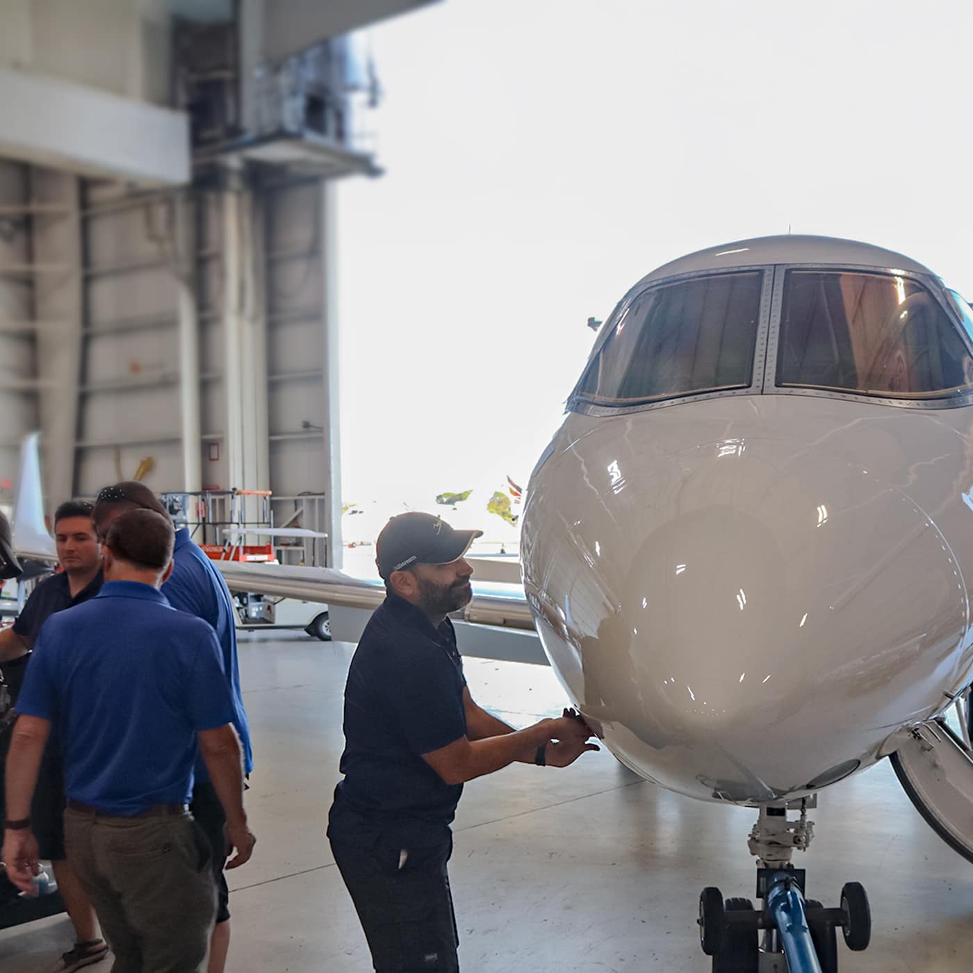 Hawker Aircraft technicians servicing the nose