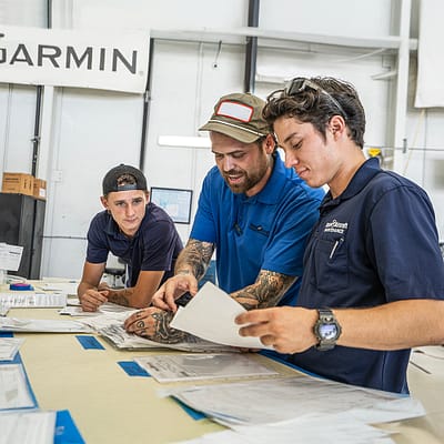 3 best friends working on paper work