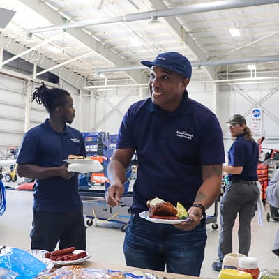 Jolly mechanics holding food